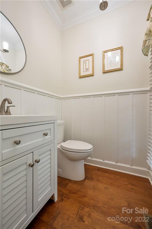 259 Bent Tree Drive Rutherfordton, NC 28139 - Photo 22 of 48 a bathroom with a toilet a sink and mirror