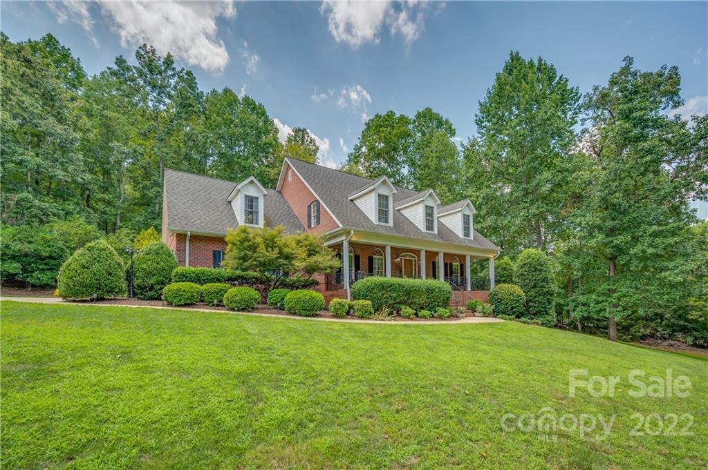 259 Bent Tree Drive Rutherfordton, NC 28139 - Photo 42 of 48 a front view of a house with a yard