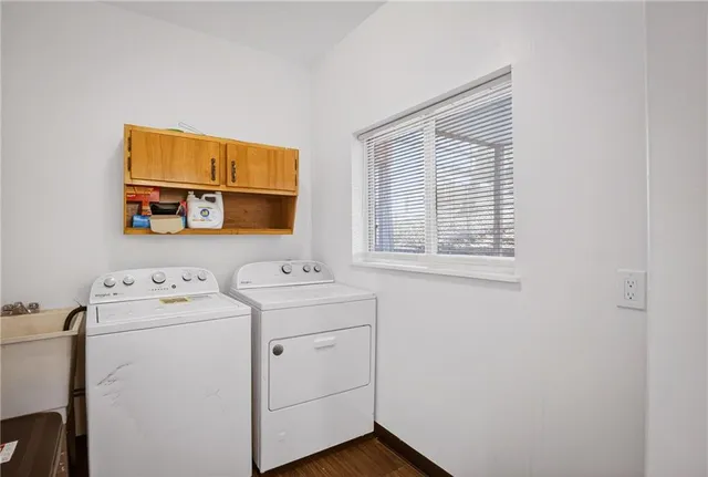 a utility room with dryer and washer