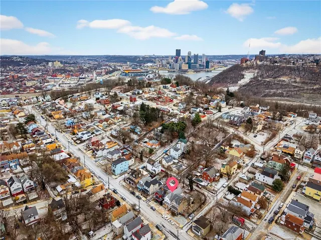 a view of a backyard of the house