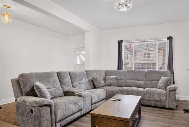 a living room with furniture and a couch
