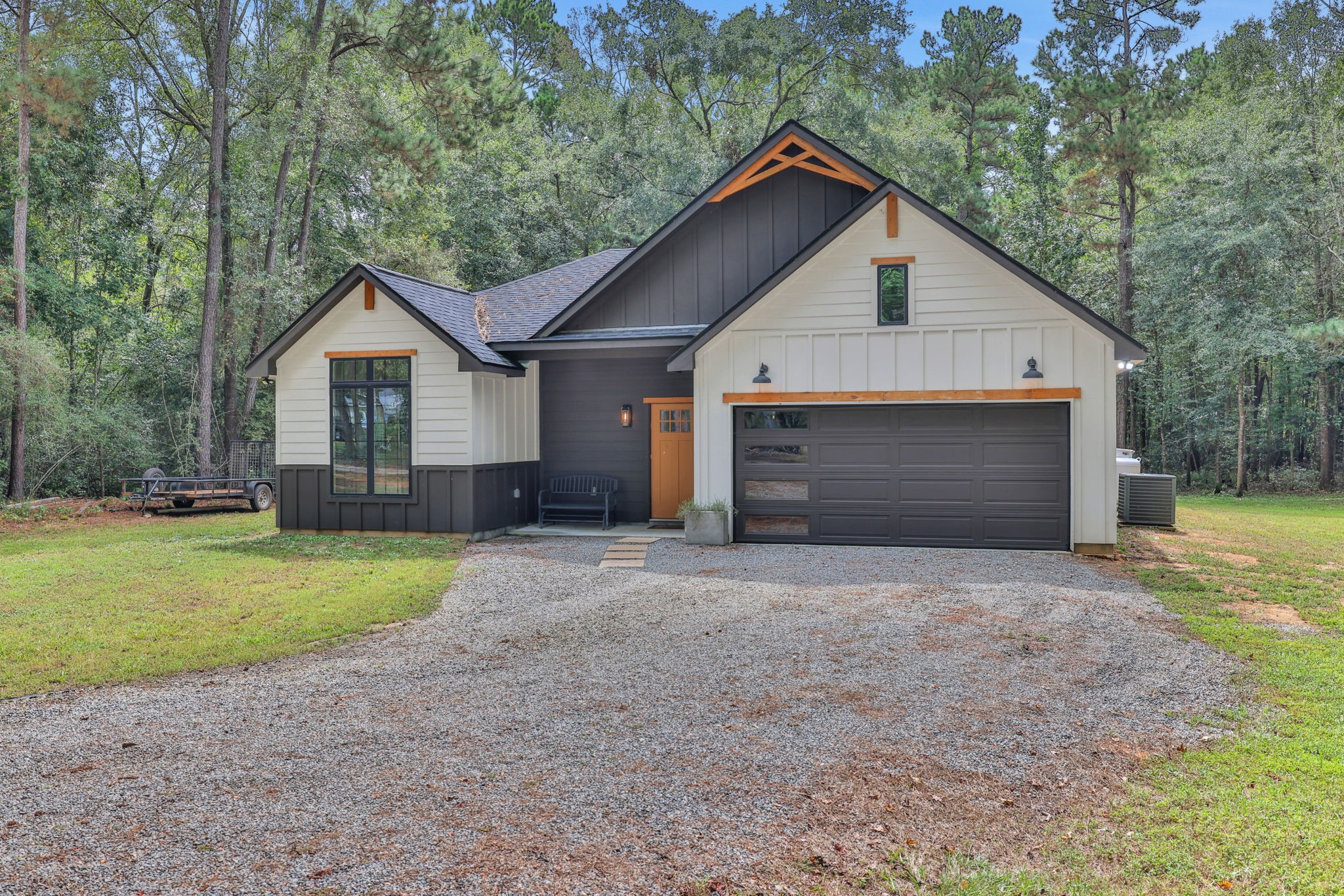 60 V Allen Lane Coldspring, TX 77331 - Photo 2 of 27 a front view of house with yard and trees