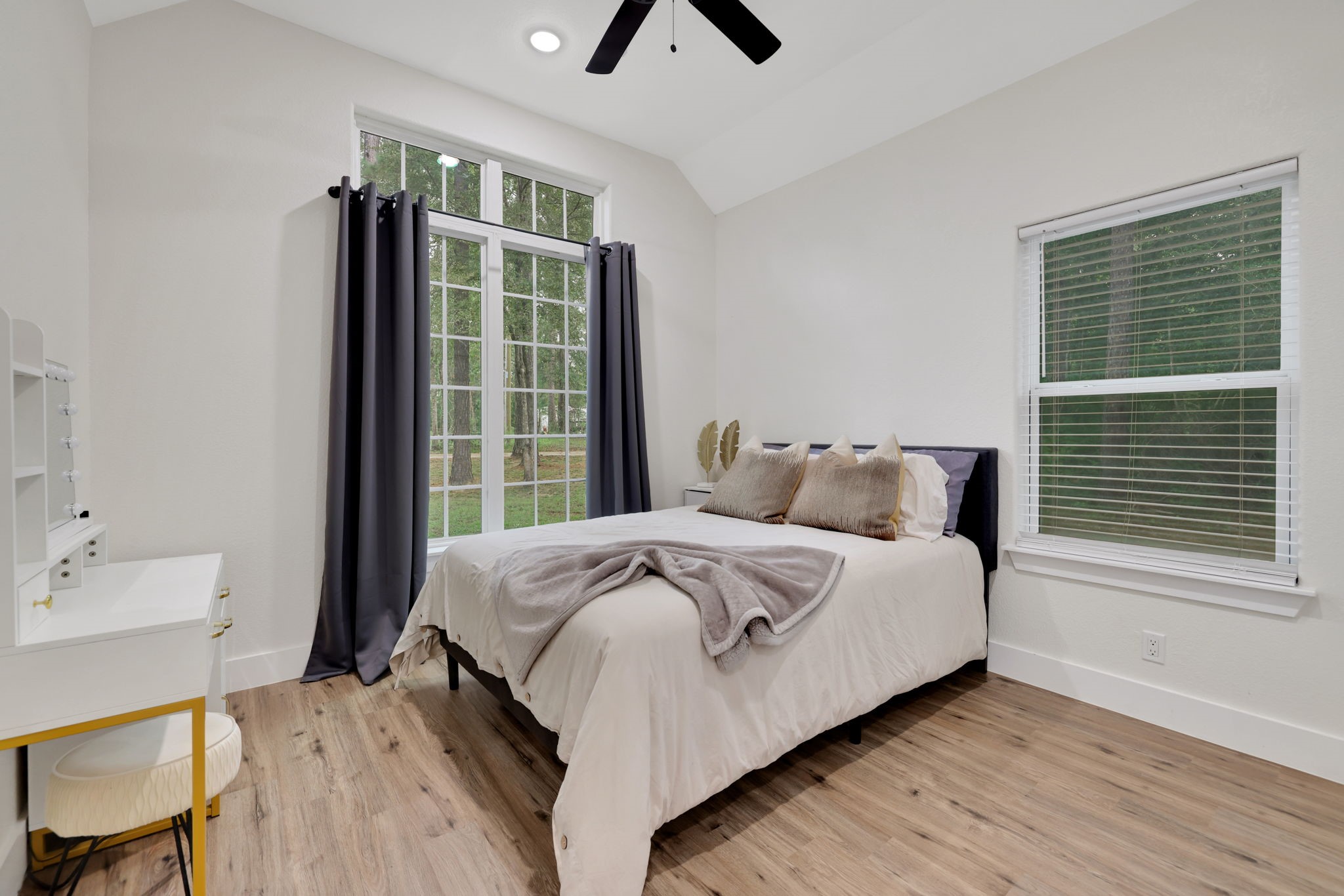 60 V Allen Lane Coldspring, TX 77331 - Photo 21 of 27 a bedroom with a bed and a window