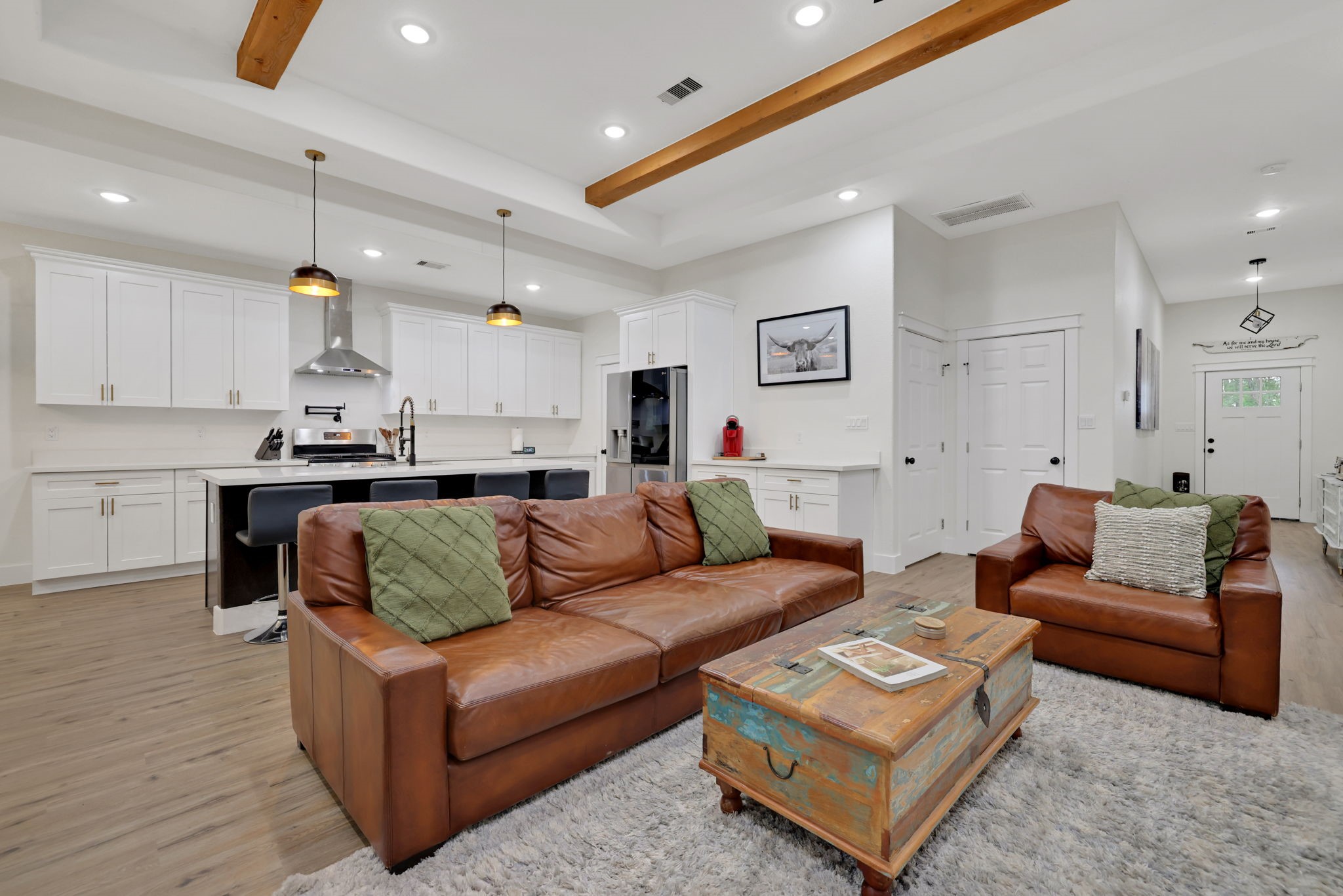 60 V Allen Lane Coldspring, TX 77331 - Photo 7 of 27 a living room with furniture and kitchen view