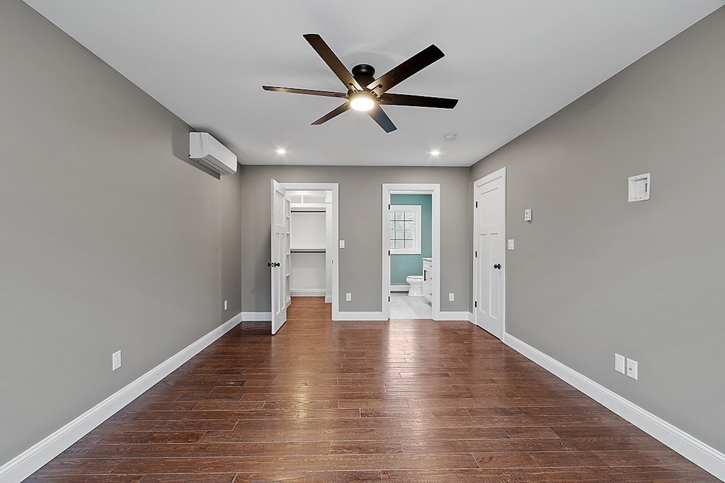 1435 South Athol Road Athol, MA 01331 - Photo 20 of 23 a view of an empty room with window and wooden floor