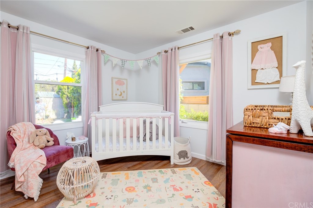 8218 Handley Avenue Los Angeles, CA 90045 - Photo 15 of 20 a bedroom with a bed and a window