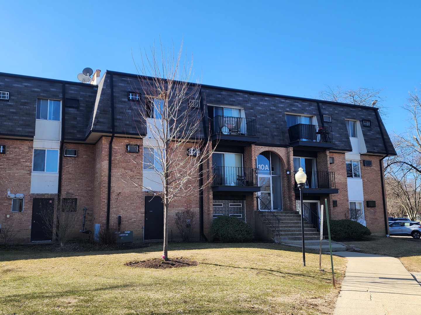 a front view of a house with street