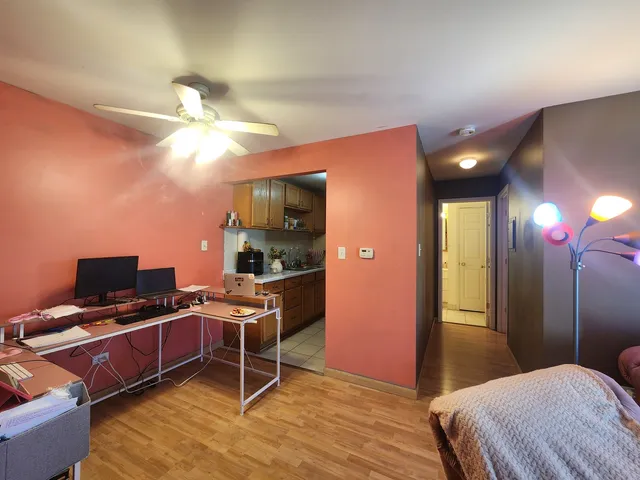 a bedroom with a bed and a closet