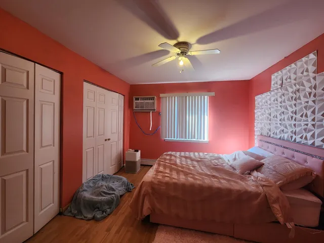 a view of backyard with table and chairs