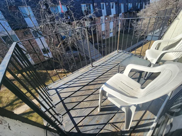 a view of a car park in front of a building