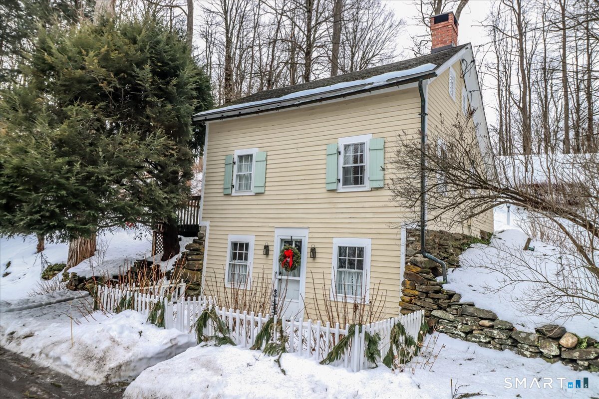 3 Gelston Road Sherman, CT 06784 - Photo 1 of 36 a view of a house with a yard covered in snow