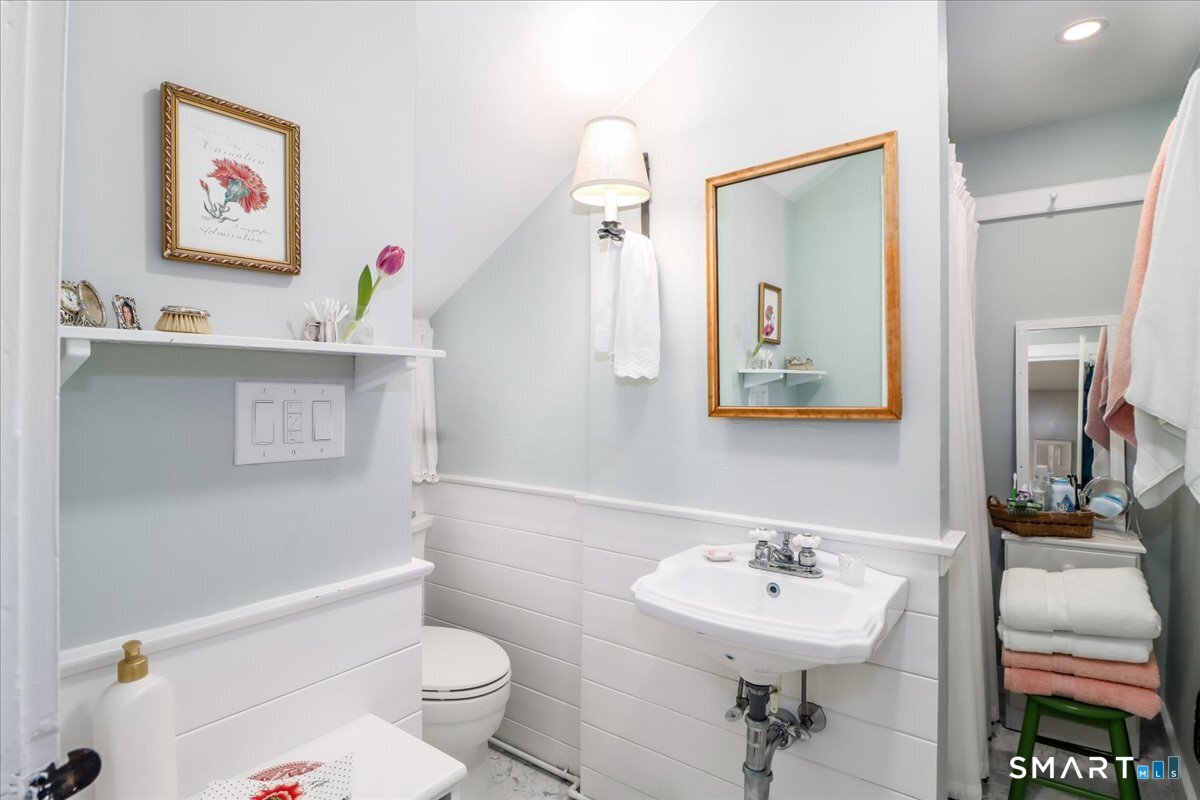 3 Gelston Road Sherman, CT 06784 - Photo 20 of 36 a bathroom with a sink mirror and a toilet