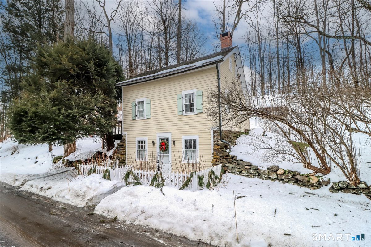 3 Gelston Road Sherman, CT 06784 - Photo 2 of 36 a view of a house with snow on the background