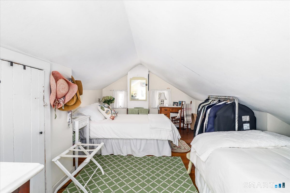 3 Gelston Road Sherman, CT 06784 - Photo 21 of 36 a bedroom with two beds and a window