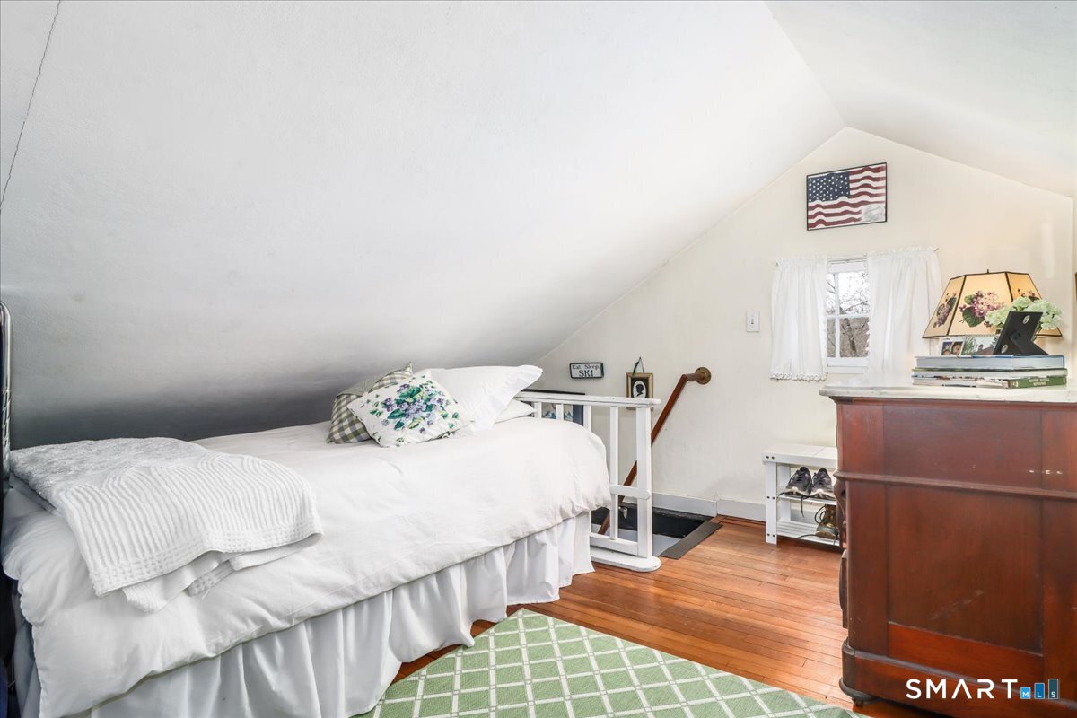 3 Gelston Road Sherman, CT 06784 - Photo 25 of 36 a bedroom with a bed window and a table