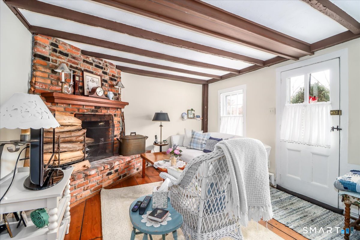3 Gelston Road Sherman, CT 06784 - Photo 27 of 36 a view of a livingroom with furniture and a window