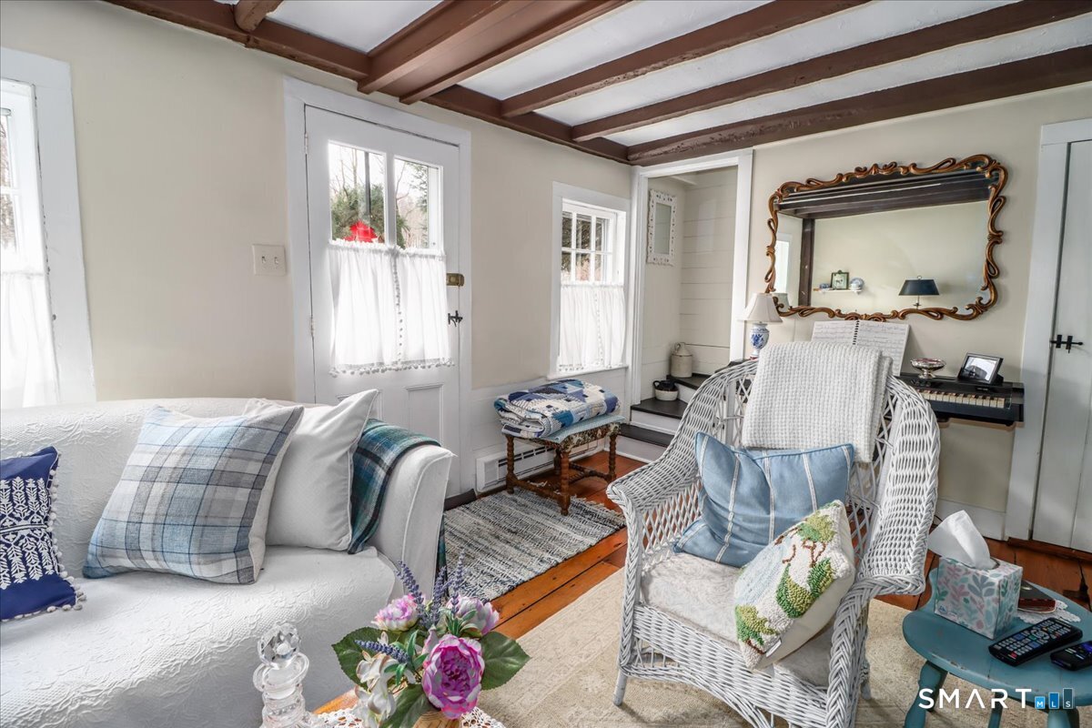 3 Gelston Road Sherman, CT 06784 - Photo 31 of 36 a living room with furniture and a window