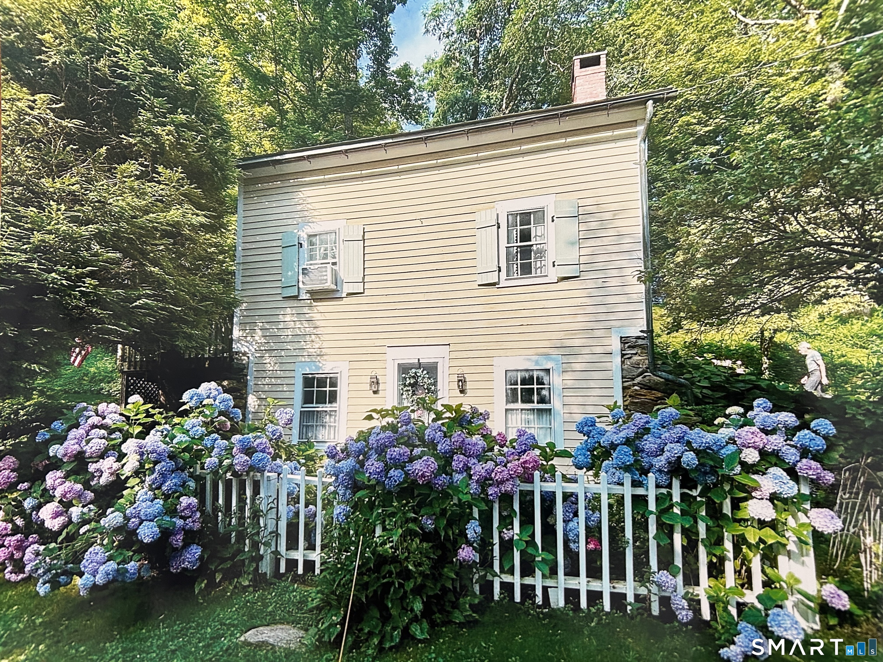 3 Gelston Road Sherman, CT 06784 - Photo 36 of 36 a front view of a house with a yard and fountain