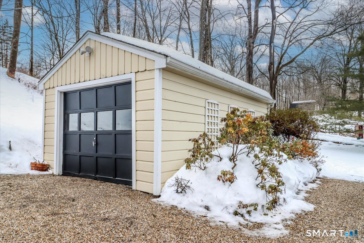 3 Gelston Road Sherman, CT 06784 - Photo 5 of 36 a view of a wooden house with a large tree