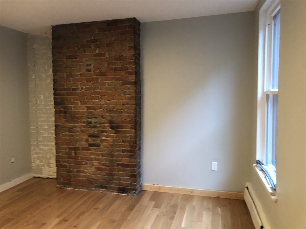 24 Bradford Street, Unit 2 Boston, MA 02118 - Photo 11 of 16 a view of wooden door