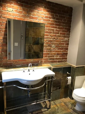 a bathroom with a sink and a toilet