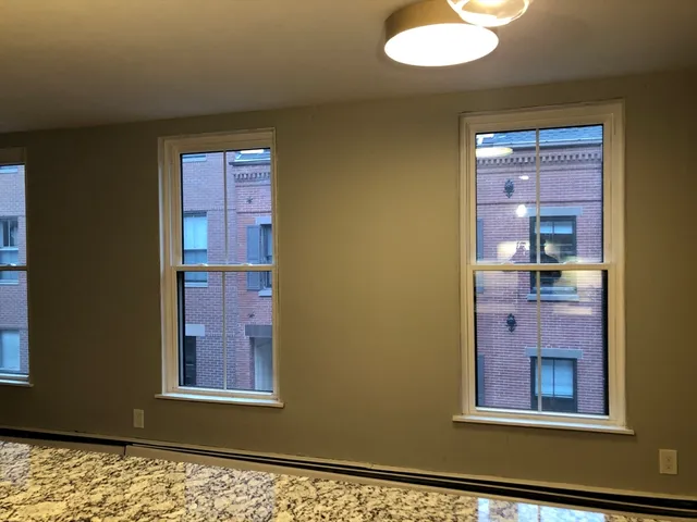 view of an empty room with a window