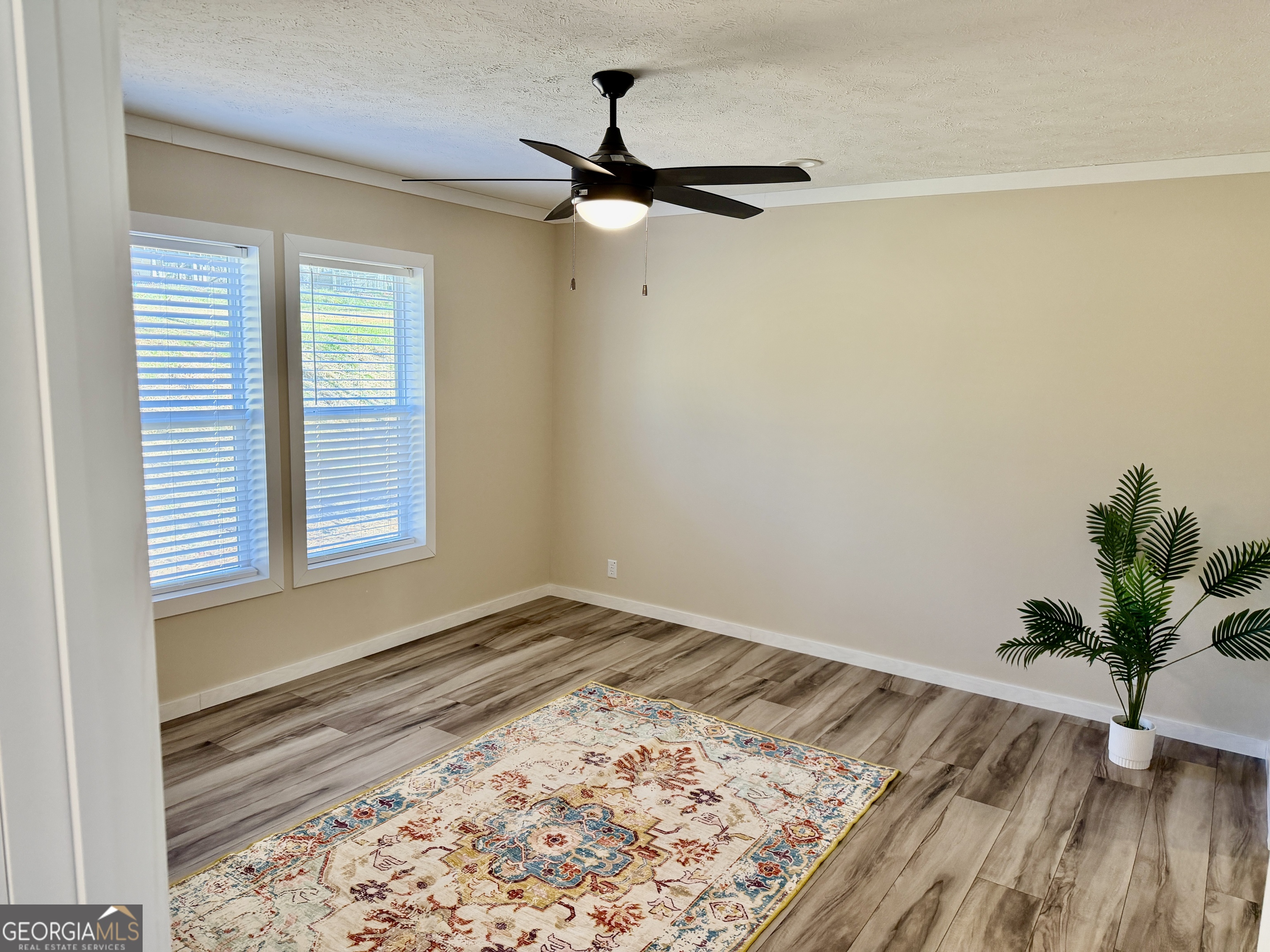 433 B C Grant Road Alto, GA 30510 - Photo 16 of 23 a view of a room with wooden floor and a window