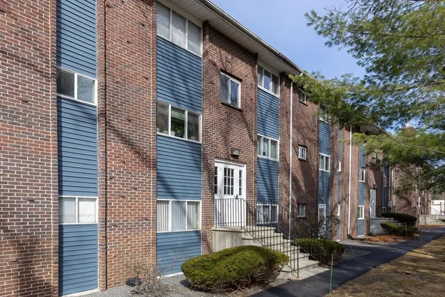 a brick building with a large windows