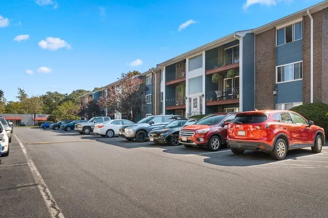 a cars parked in front of a building