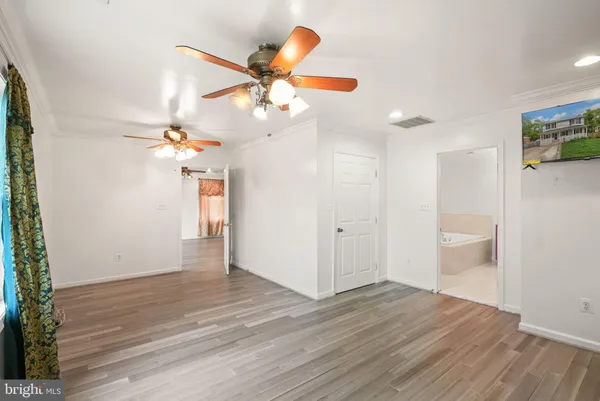 a bathroom with a bathtub and a sink