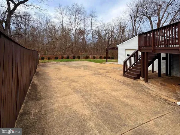a front view of a house with a fence