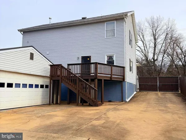 a view of a porch with wooden floor and stairs