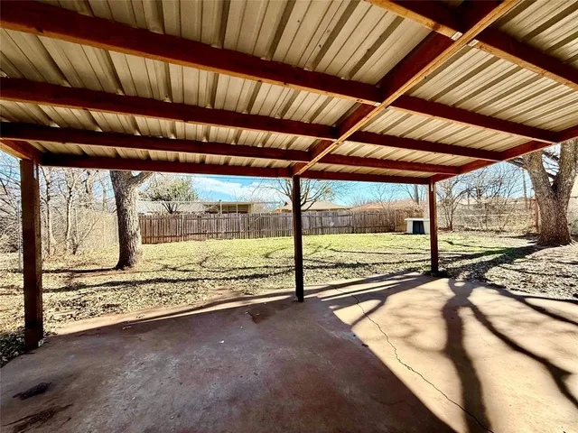 a view of a backyard of a house