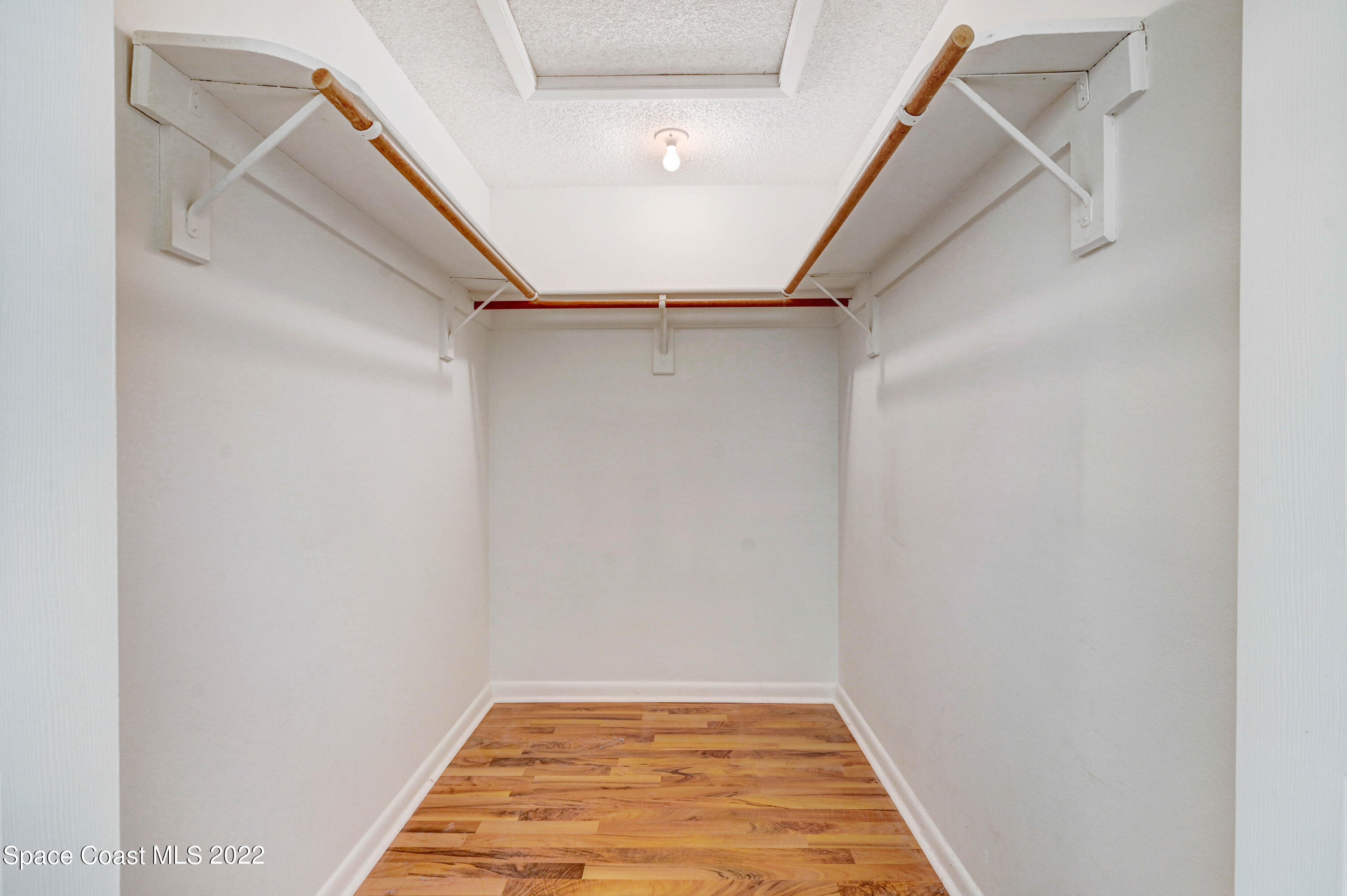 373 Myrtlewood Road Melbourne, FL 32940 - Photo 27 of 42 a view of an empty walk in closet