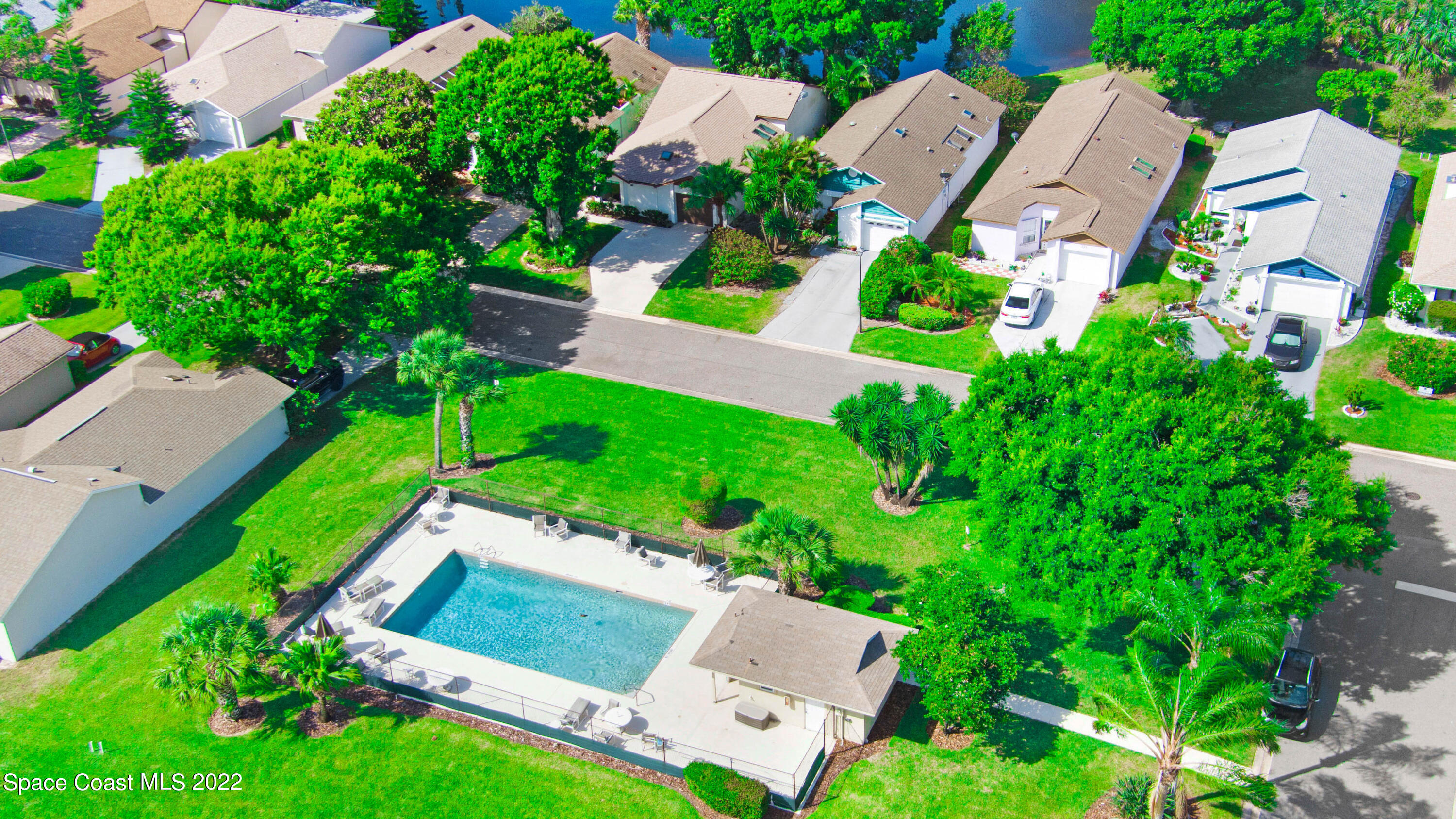 373 Myrtlewood Road Melbourne, FL 32940 - Photo 33 of 42 an aerial view of a house with garden space and street view