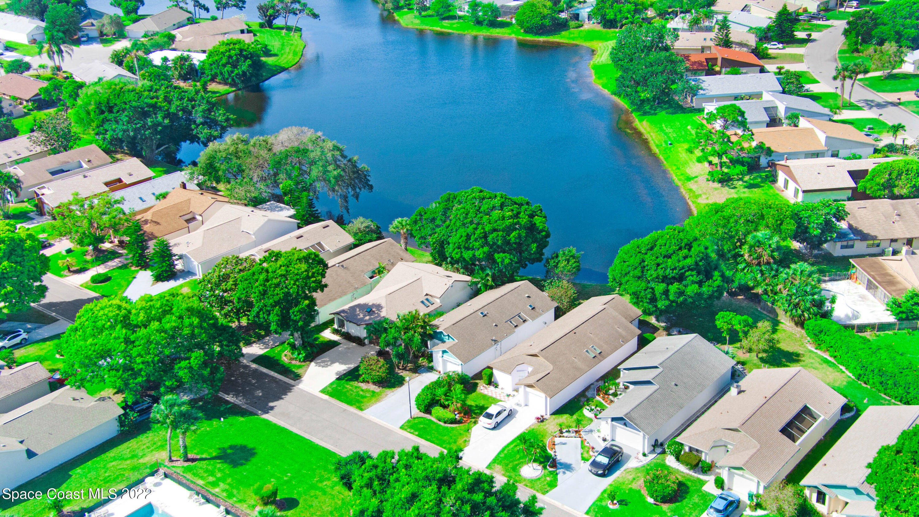 373 Myrtlewood Road Melbourne, FL 32940 - Photo 35 of 42 an aerial view of residential houses with outdoor space and street view