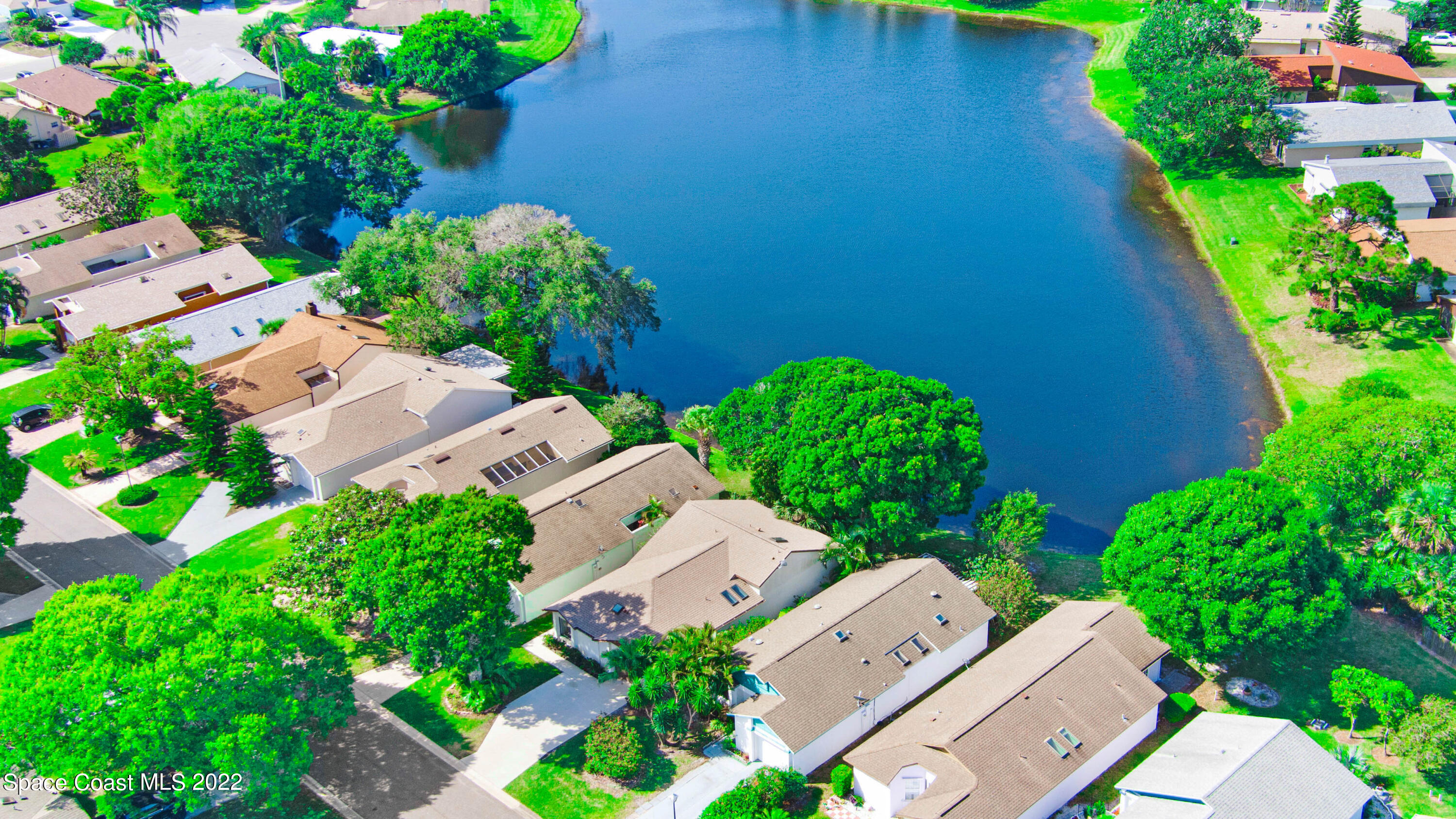 373 Myrtlewood Road Melbourne, FL 32940 - Photo 36 of 42 an aerial view of a house with a garden