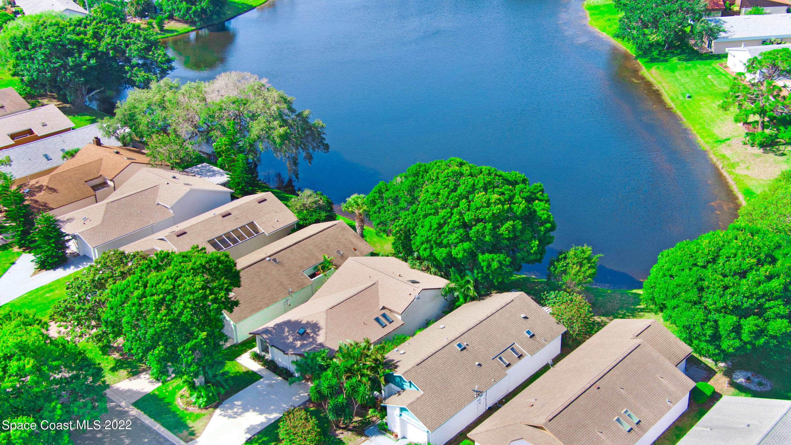 373 Myrtlewood Road Melbourne, FL 32940 - Photo 37 of 42 an aerial view of a house with a yard