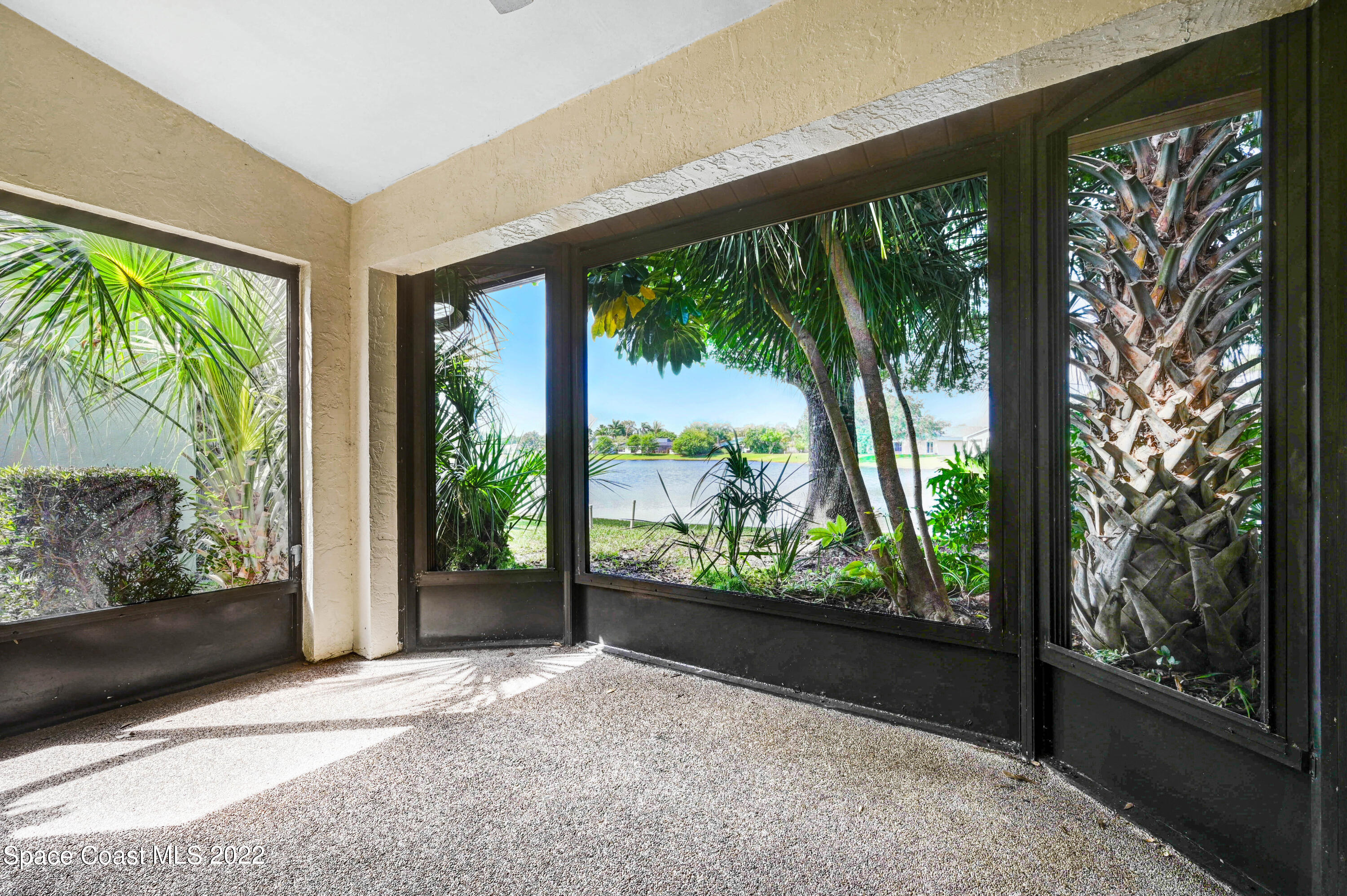 373 Myrtlewood Road Melbourne, FL 32940 - Photo 6 of 42 a view of a garden from a room