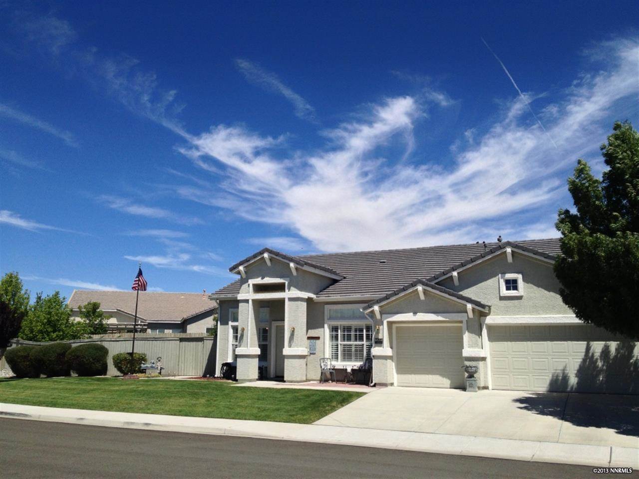 9534 Steep Climb Court Reno, NV 89521 - Photo 1 of 1 a front view of a house with a garden