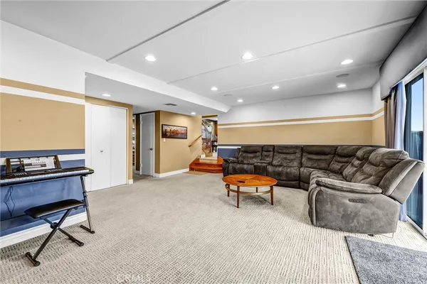 a living room with furniture and a couch