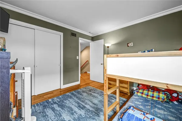 a very nice looking room with wooden floor