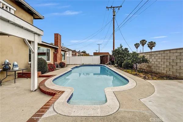 a view of a house with swimming pool