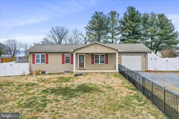 a house with trees in the background