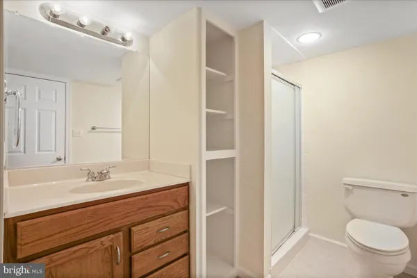 a view of room with a ceiling fan