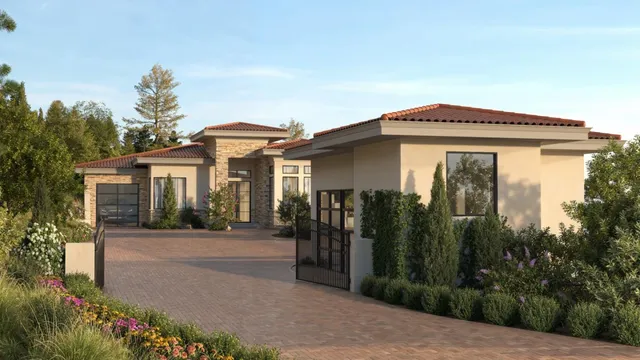 a front view of a house with garden