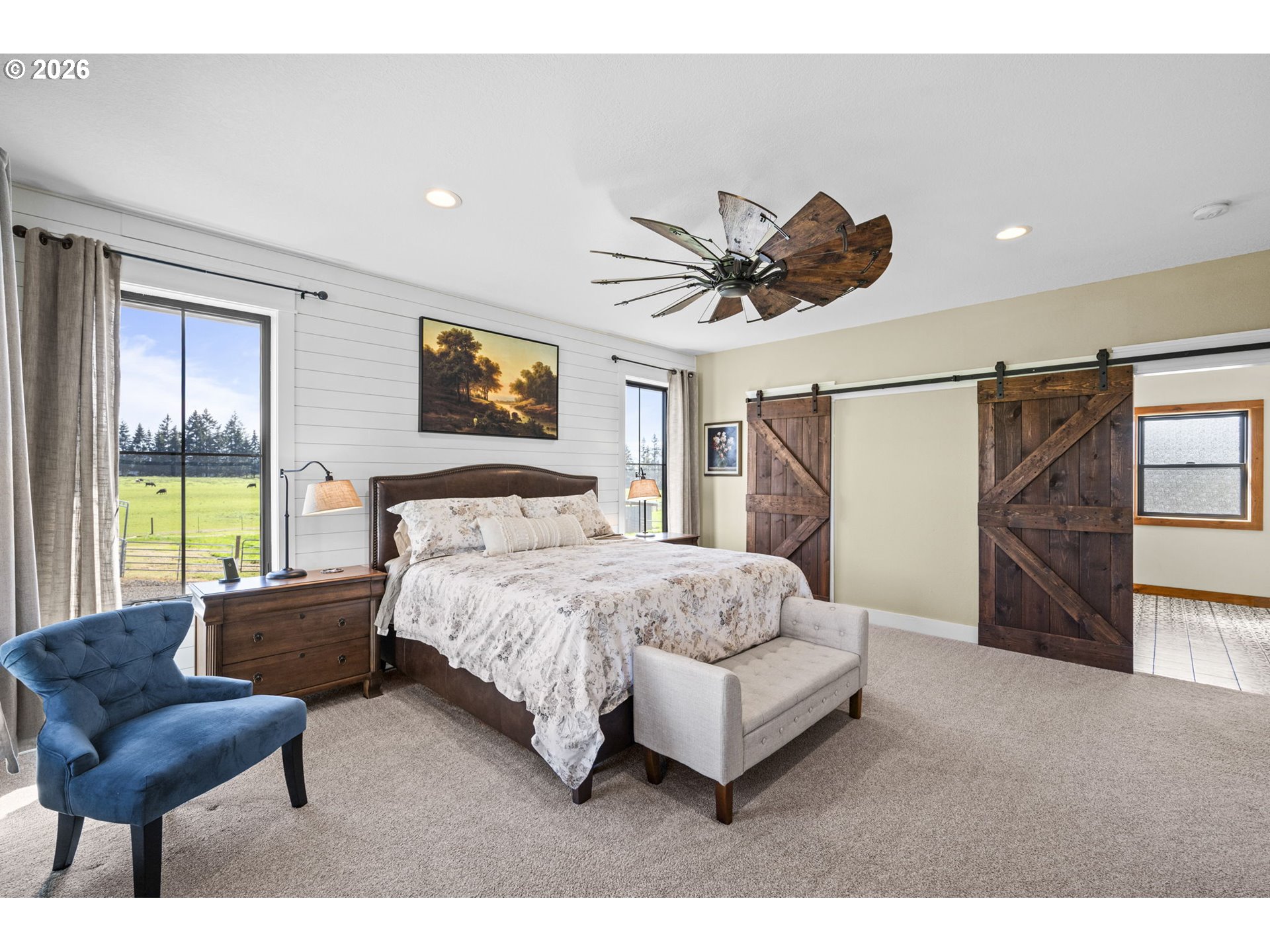 33246 South Wilhoit Road Molalla, OR 97038 - Photo 12 of 48 a spacious bedroom with a bed and a couch