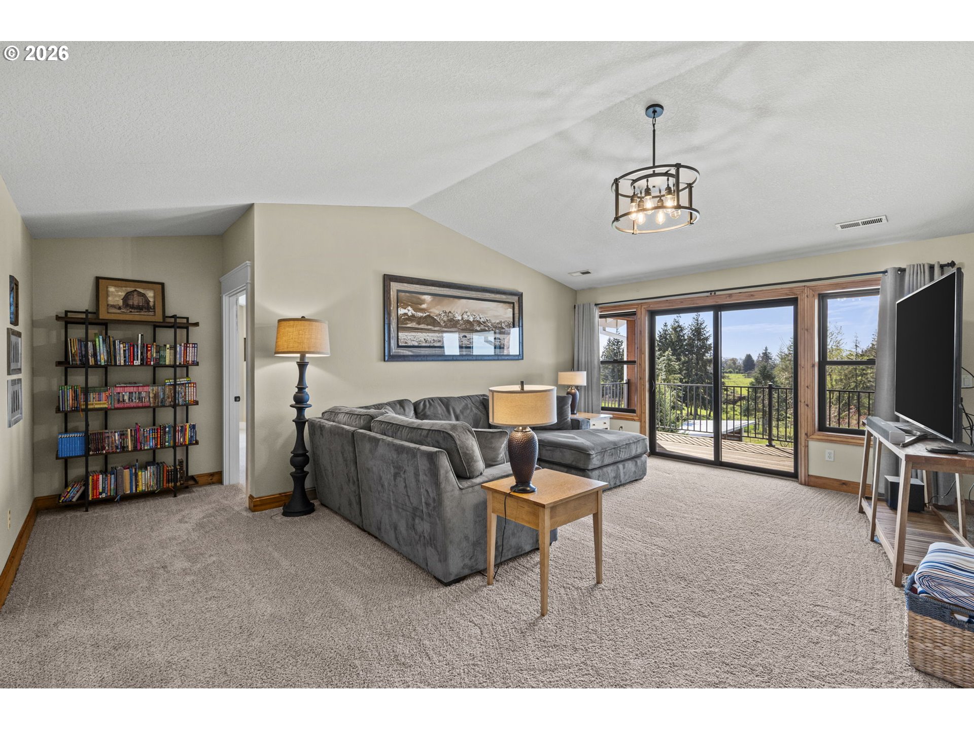 33246 South Wilhoit Road Molalla, OR 97038 - Photo 16 of 48 a living room with furniture a flat screen tv and a large window