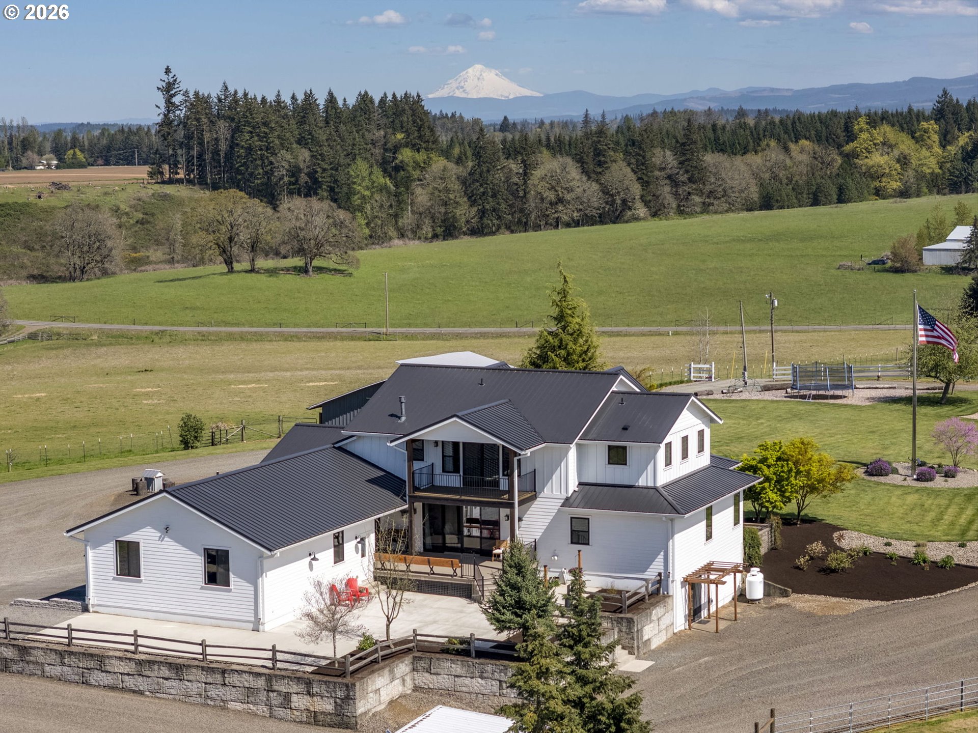 33246 South Wilhoit Road Molalla, OR 97038 - Photo 46 of 48 an aerial view of a house with a garden and lake view
