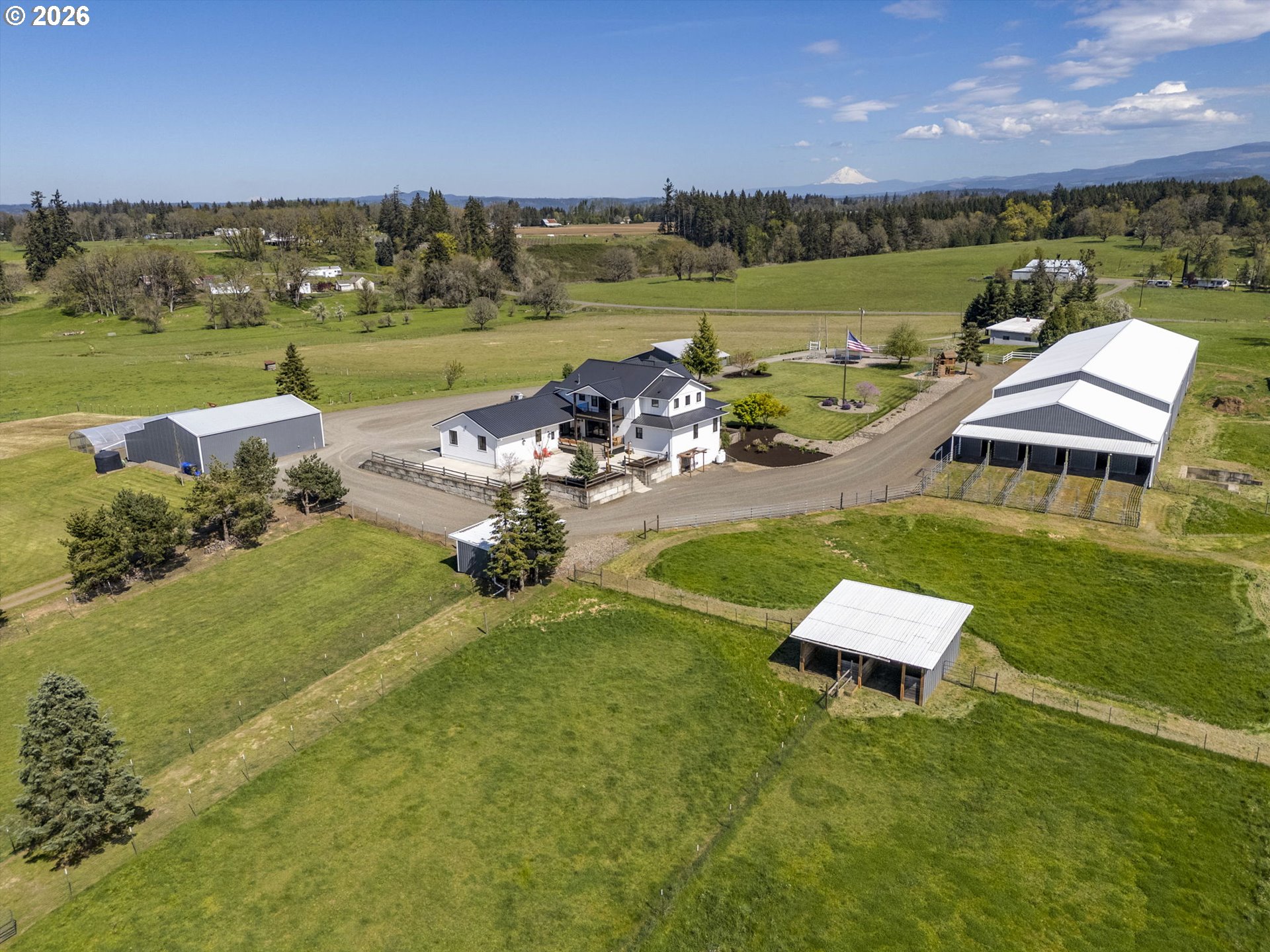 33246 South Wilhoit Road Molalla, OR 97038 - Photo 47 of 48 a view of a lake with lawn chairs